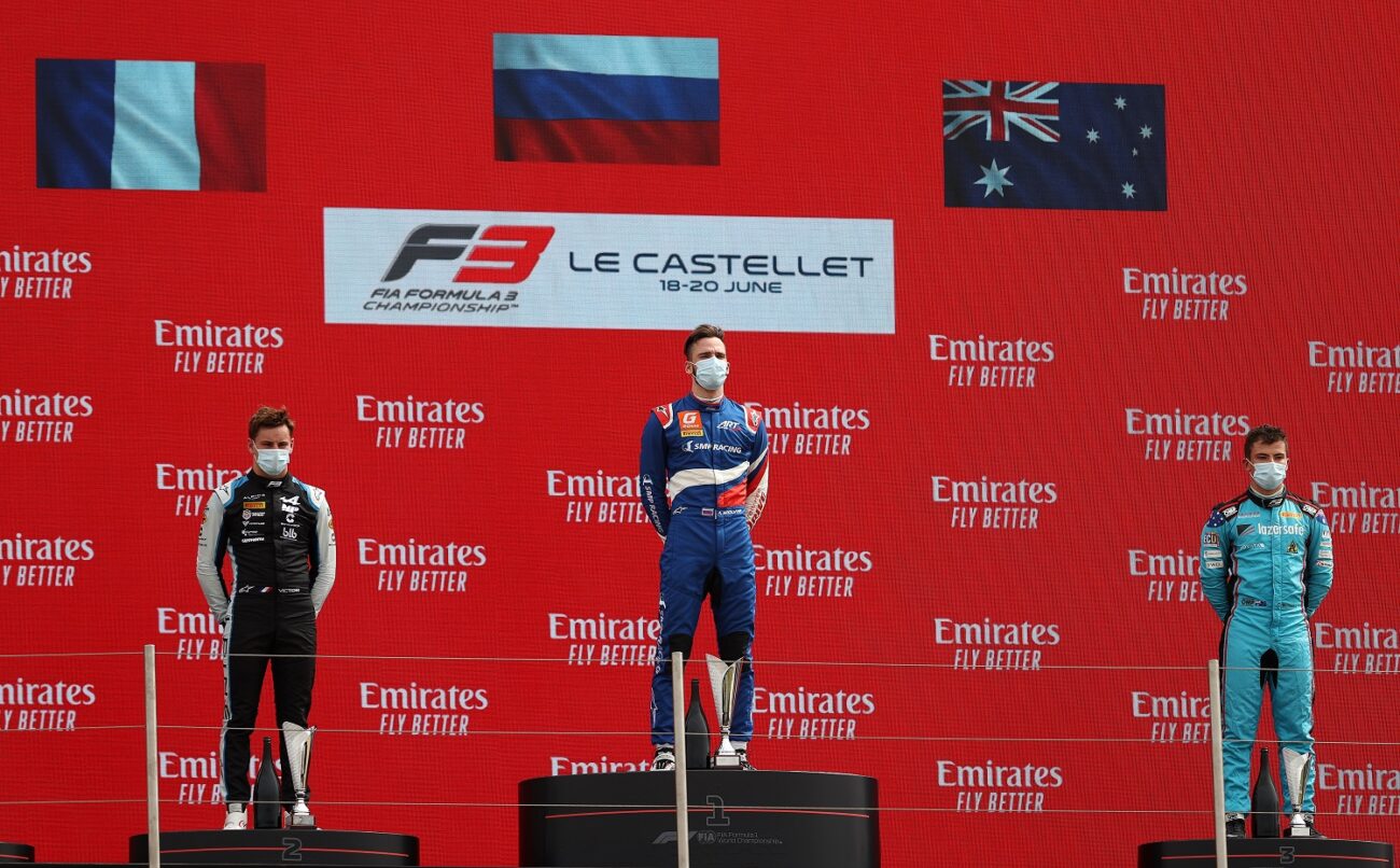 LE CASTELLET, FRANCE - JUNE 19: Race winner Aleksandr Smolyar of Russia and ART Grand Prix, second placed Victor Martins of France and MP Motorsport and third placed Calan Williams of Australia and Jenzer Motorsport stand on the podium during race 1 of Round 2:Le Castellet of the Formula 3 Championship at Circuit Paul Ricard on June 19, 2021 in Le Castellet, France. (Photo by Clive Rose/Getty Images)