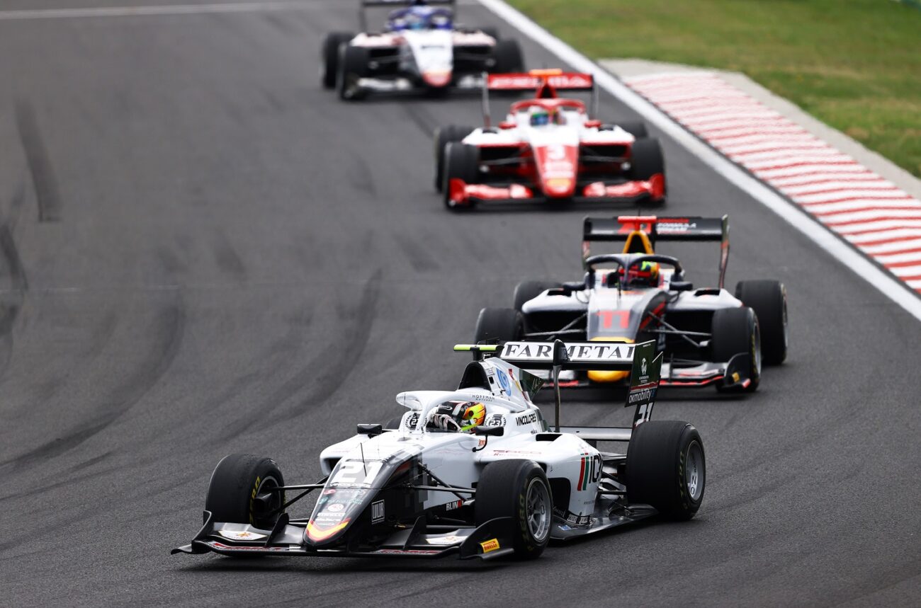 BUDAPEST, HUNGARY - JULY 31: Lorenzo Colombo of Italy and Campos Racing (21) leads Ayumu Iwasa of Japan and Hitech Grand Prix (11) during Round 4:Budapest race 1 of the Formula 3 Championship at Hungaroring on July 31, 2021 in Budapest, Hungary. (Photo by Bryn Lennon/Getty Images)