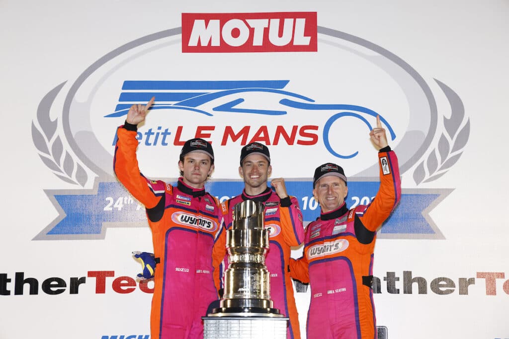 #52: PR1 Mathiasen Motorsports ORECA LMP2 07, LMP2: Ben Keating, Mikkel Jensen, Scott Huffaker  celebrate winning the championship on the podium