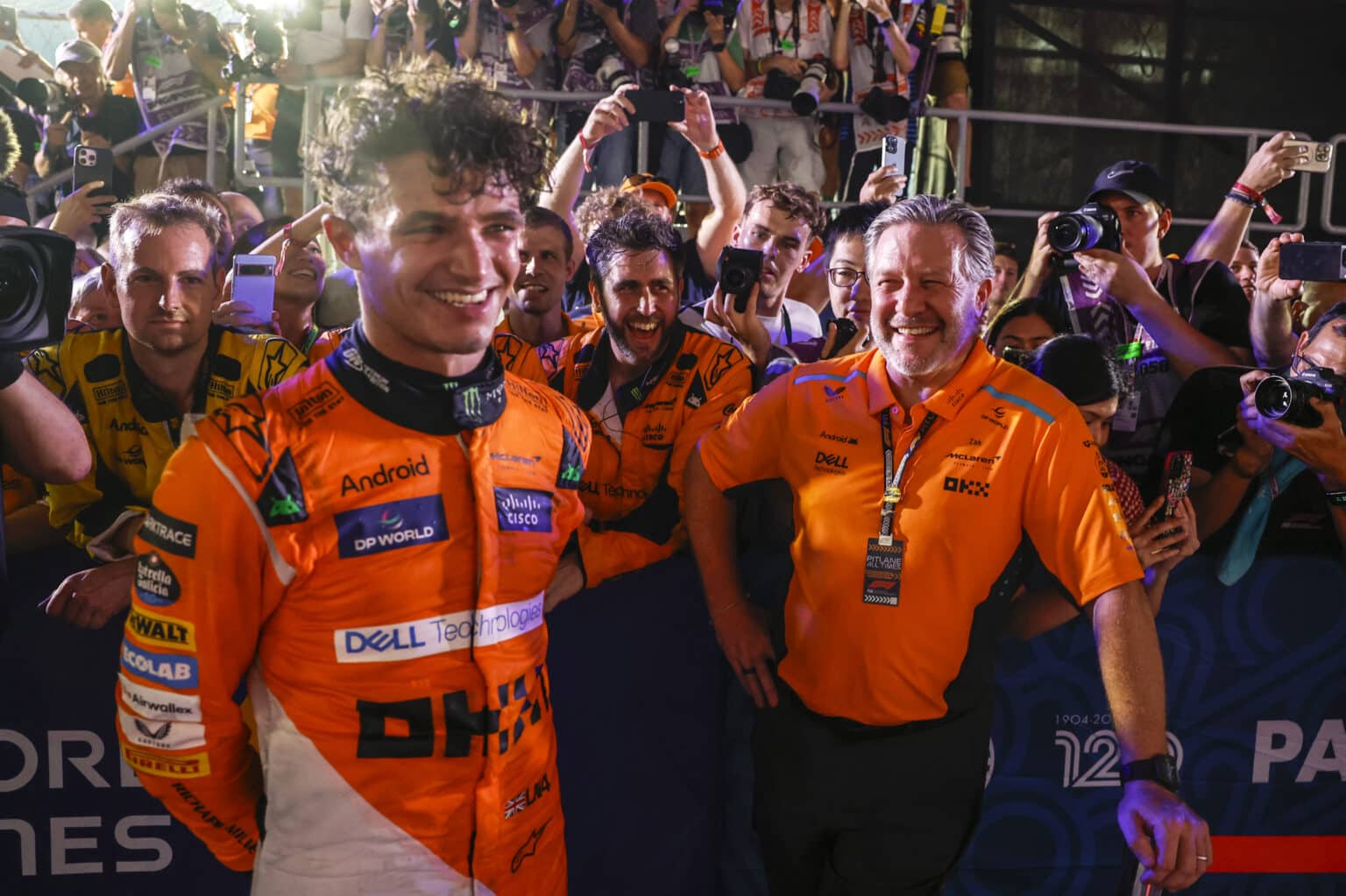 Lando Norris, McLaren F1 Team, 1st position, Zak Brown, CEO, McLaren Racing, and the McLaren team celebrate in Parc Ferme