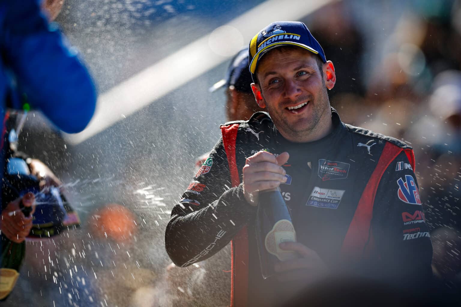 #7: Porsche Penske Motorsports, Porsche 963, GTP:  Nick Tandy, Champagne. Foto: IMSA/Jake Galstad
