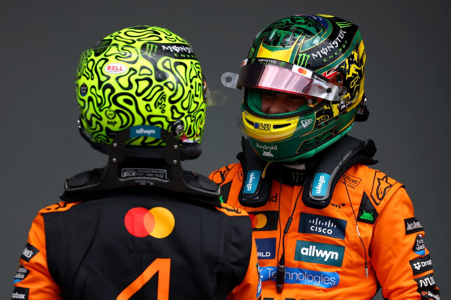 MELBOURNE, AUSTRALIA - MARCH 15: Pole position qualifier Lando Norris of Great Britain and McLaren and Second placed qualifier Oscar Piastri of Australia and McLaren congratulate each other during qualifying ahead of the F1 Grand Prix of Australia at Albert Park Grand Prix Circuit on March 15, 2025 in Melbourne, Australia. (Photo by Sam Bloxham/LAT Images)