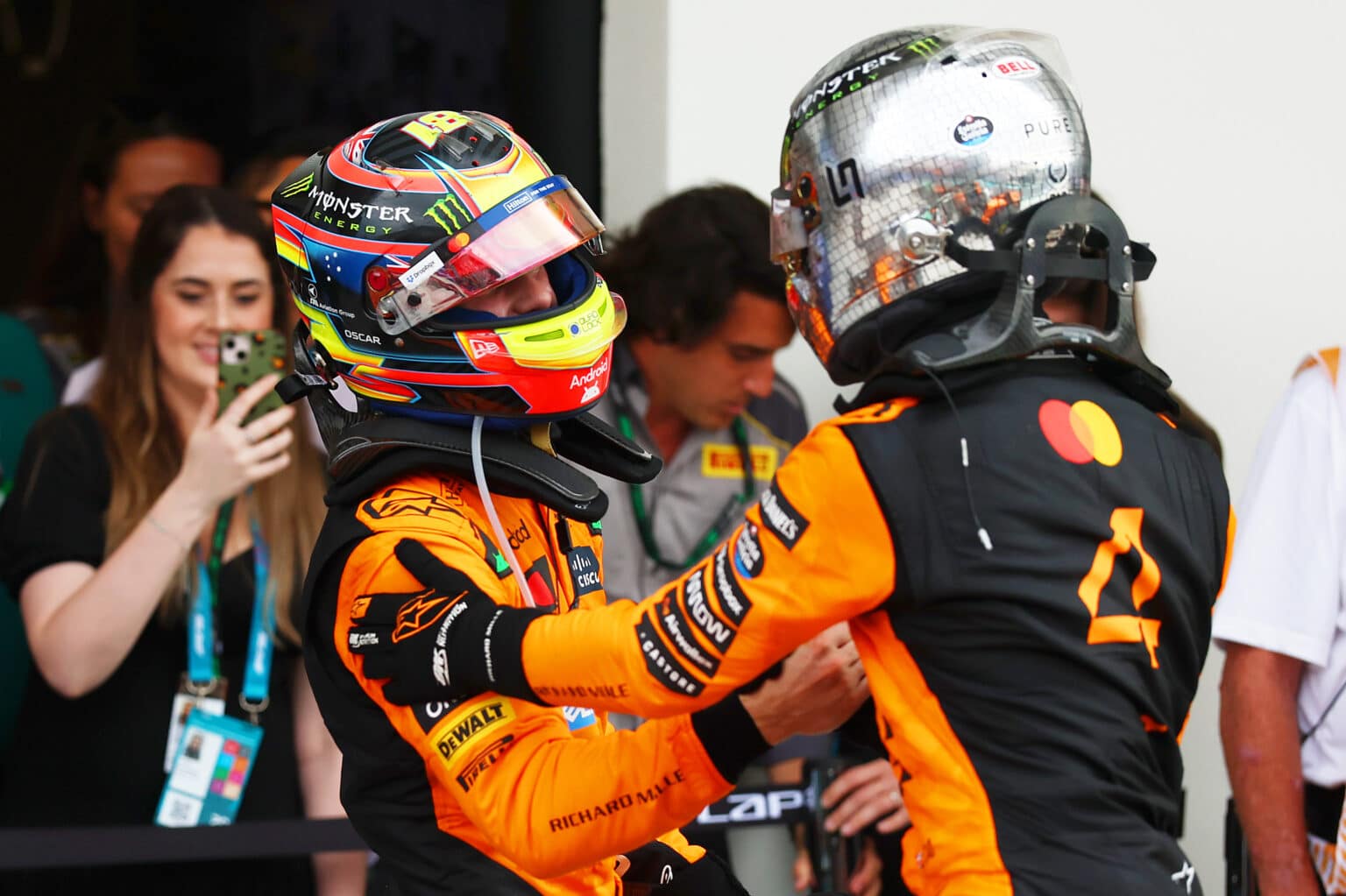 MIAMI, FLORIDA - MAY 04: Race winner Oscar Piastri of Australia and McLaren and Second placed Lando Norris of Great Britain and McLaren celebrate in parc ferme during the F1 Grand Prix of Miami at Miami International Autodrome on May 04, 2025 in Miami, Florida. (Photo by Andy Hone/LAT Images) McLaren Racing Media