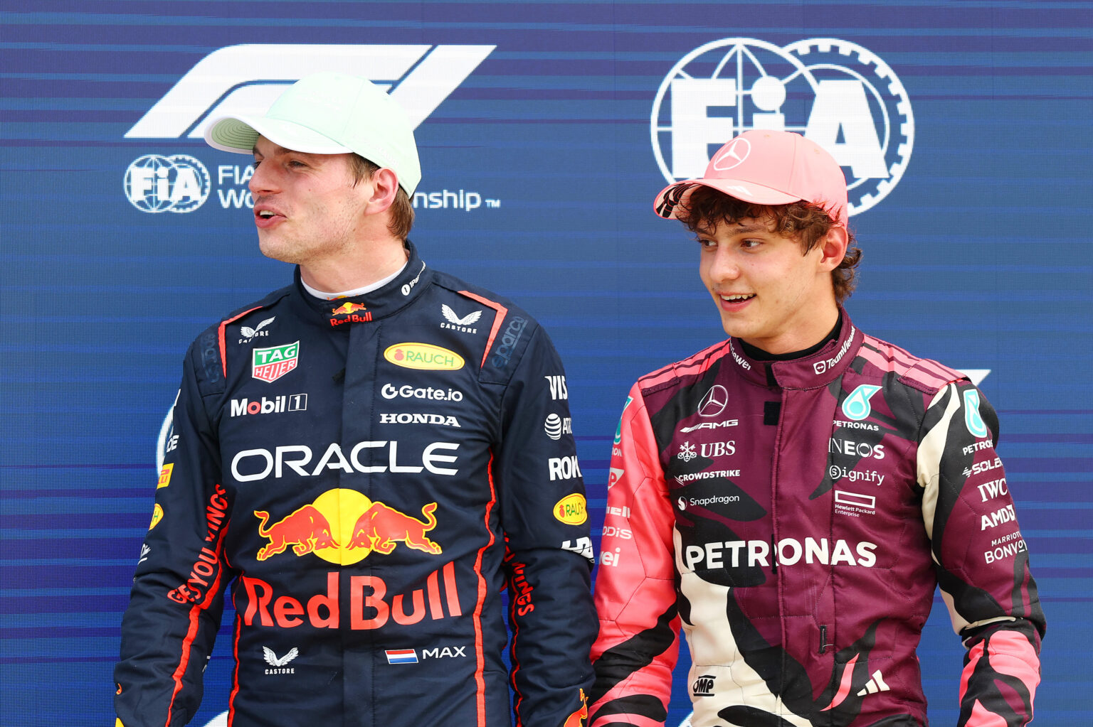 MIAMI, FLORIDA - MAY 03: Pole position qualifier Max Verstappen of the Netherlands and Oracle Red Bull Racing and Third placed qualifier Andrea Kimi Antonelli of Italy and Mercedes AMG Petronas F1 Team looks on during qualifying ahead of the F1 Grand Prix of Miami at Miami International Autodrome on May 03, 2025 in Miami, Florida. (Photo by Mark Thompson/Getty Images) // Getty Images / Red Bull Content Pool // SI202505040079 // Usage for editorial use only //