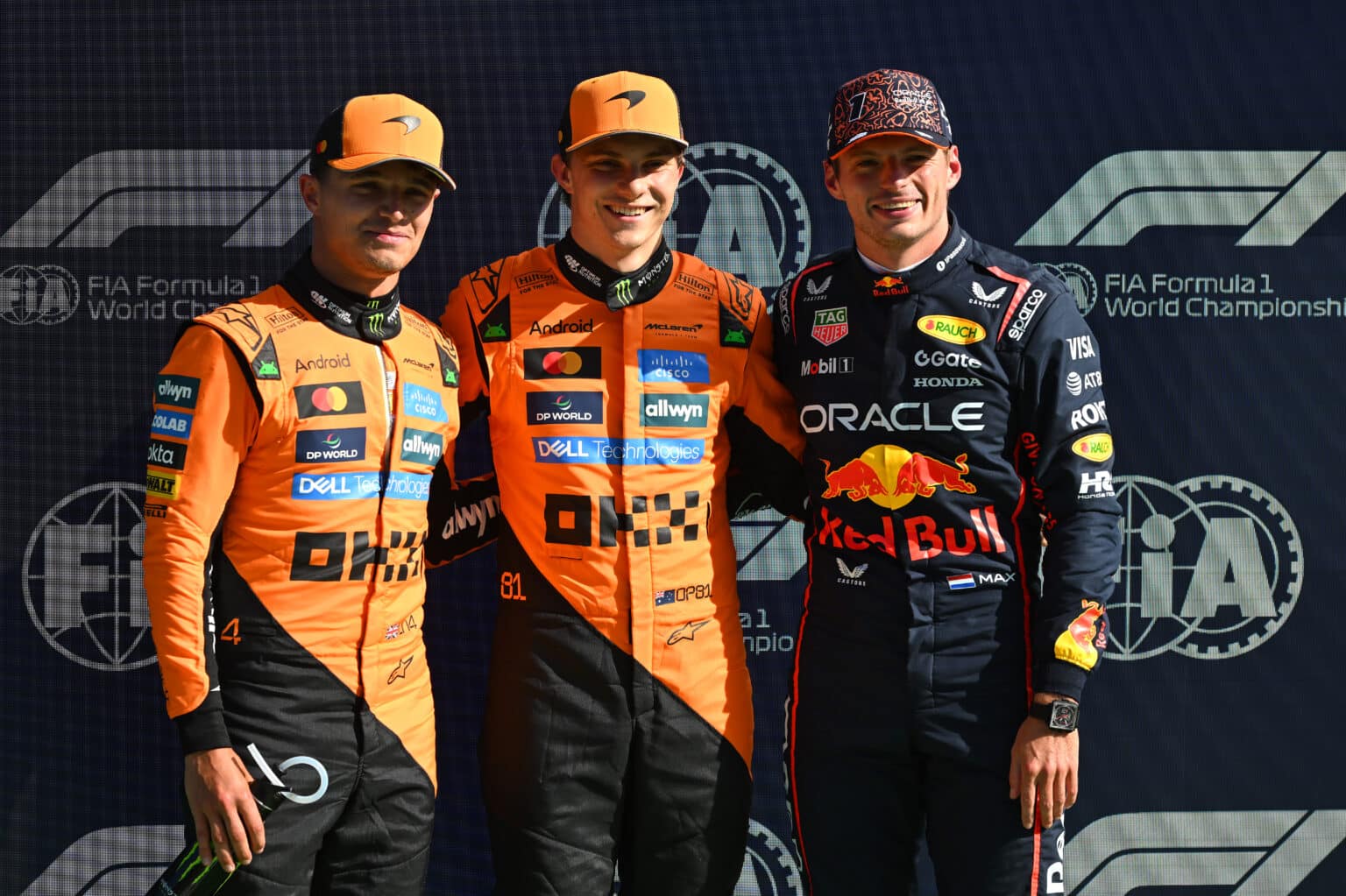 ZANDVOORT, NETHERLANDS - AUGUST 30: Pole position qualifier Oscar Piastri of Australia and McLaren Second placed qualifier Lando Norris of Great Britain and McLaren and Third placed qualifier Max Verstappen of the Netherlands and Oracle Red Bull Racing during qualifying ahead of the F1 Grand Prix of Netherlands at Circuit Zandvoort on August 30, 2025 in Zandvoort, Netherlands. (Photo by Rudy Carezzevoli/Getty Images) McLaren Racing Media