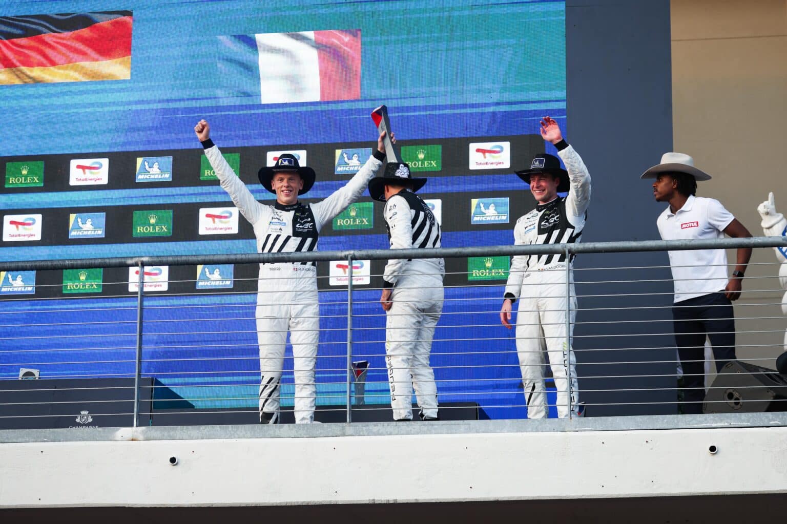 94 VANDOORNE Stoffel (bel), DUVAL Loic (fra), JAKOBSEN Malthe (dnk), Peugeot TotalEnergies, Peugeot 9X8 #94, Hypercar, podium during the Lone Star Le Mans 2025, 6th round of the 2025 FIA World Endurance Championship, from September 5 to 7, 2025 on the Circuit of The Americas in Austin, Texas, United States of America - Photo Antonin Vincent / DPPI