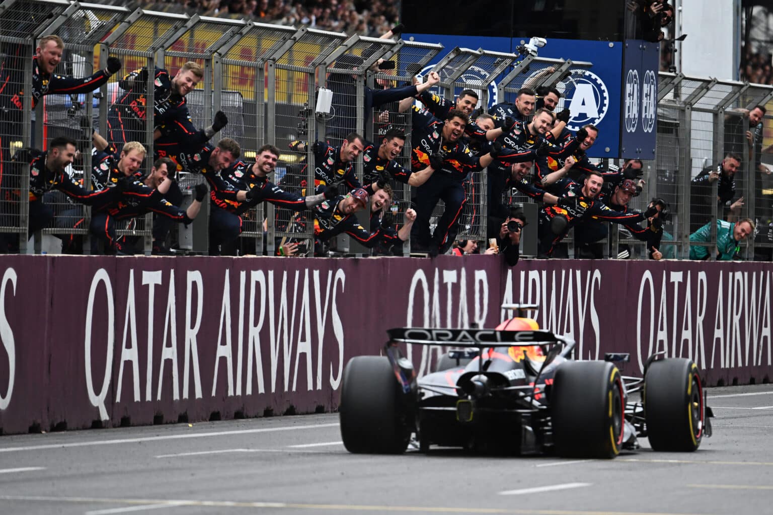 BAKU, AZERBAIJAN - SEPTEMBER 21: Race winner. Max Verstappen of the Netherlands driving the (1) Oracle Red Bull Racing RB21 passes his team on the pit wall during the F1 Grand Prix of Azerbaijan at Baku City Circuit on September 21, 2025 in Baku, Azerbaijan. (Photo by Simon Galloway/LAT Images) // Getty Images / Red Bull Content Pool // SI202509210376 // Usage for editorial use only //
