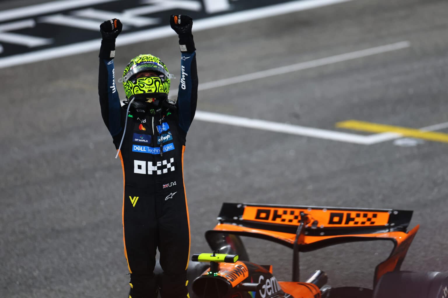 ABU DHABI, UNITED ARAB EMIRATES - DECEMBER 07: 2025 F1 World Drivers Champion and Third placed Lando Norris of Great Britain and McLaren celebrates in parc ferme during the F1 Grand Prix of Abu Dhabi at Yas Marina Circuit on December 07, 2025 in Abu Dhabi, United Arab Emirates. (Photo by Zak Mauger/LAT Images)