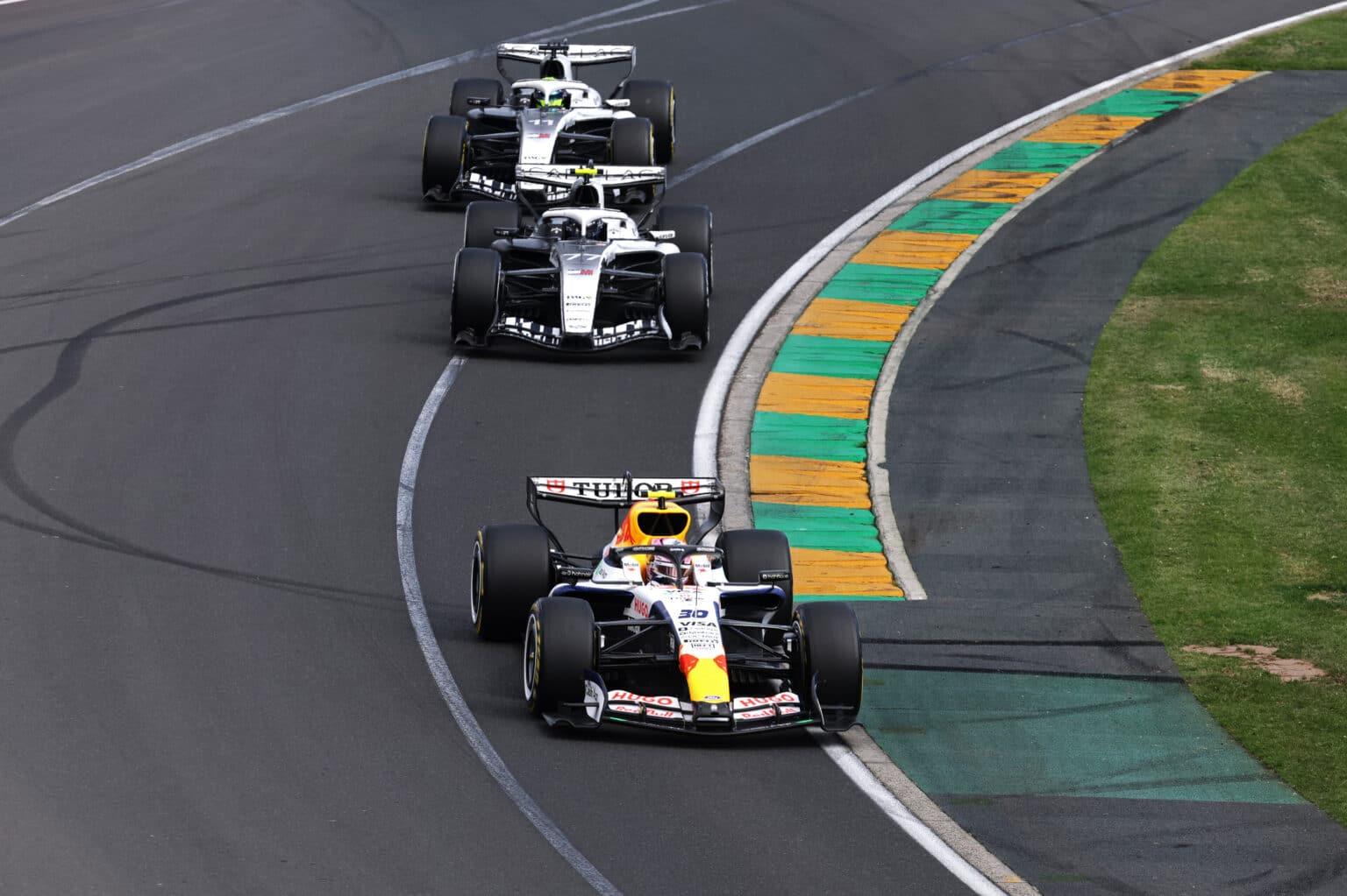 MELBOURNE, AUSTRALIA - MARCH 08: Liam Lawson of New Zealand driving the (30) Visa Cash App Racing Bulls VCARB 03 RB Ford leads Valtteri Bottas of Finland driving the (77) Cadillac F1 Team MAC-26 Ferrari on track during the F1 Grand Prix of Australia at Albert Park Grand Prix Circuit on March 08, 2026 in Melbourne, Australia. (Photo by Mark Thompson/Getty Images) // Getty Images / Red Bull Content Pool // SI202603080140 // Usage for editorial use only //