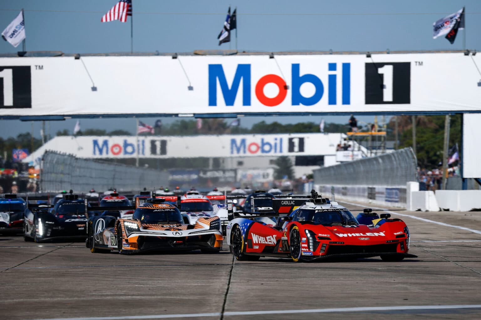 #31: Cadillac Whelen, Cadillac V-Series.R, GTP: Jack Aitken, Earl Bamber, Frederik Vesti, #60: Acura Meyer Shank Racing w/Curb Agajanian, Acura ARX-06, GTP: Tom Blomqvist, Colin Braun, Scott Dixon, #6: Porsche Penske Motorsport, Porsche 963, GTP: Laurens Vanthoor, Kevin Estre, Matt Campbell, #10: Cadillac Wayne Taylor Racing, Cadillac V-Series.R, GTP: Ricky Taylor, Filipe Albuquerque, Will Stevens, lead at the start